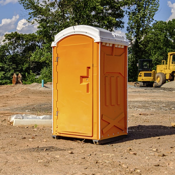 what is the cost difference between standard and deluxe portable restroom rentals in Browndell